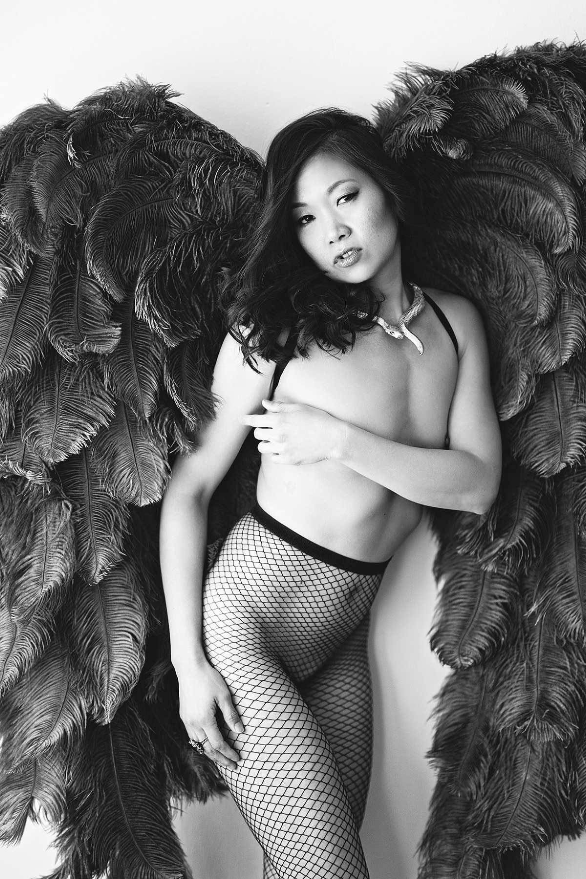 https://simplybeautifulboudoir.com/wp-content/uploads/2024/02/Fishnets_Angel-Wings_Asian-Boudoir-Photographer(pp_w1200_h1799).jpg